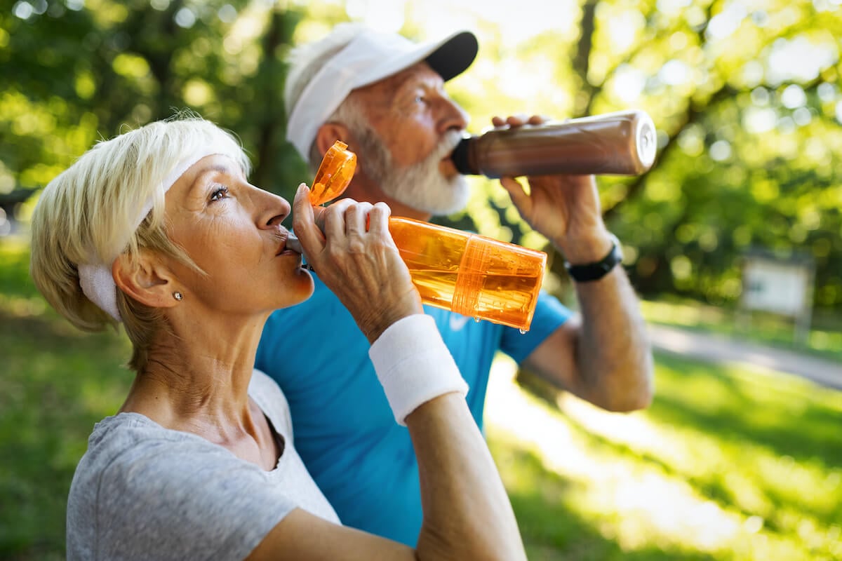 Senior couple drinking water_importance of hydration